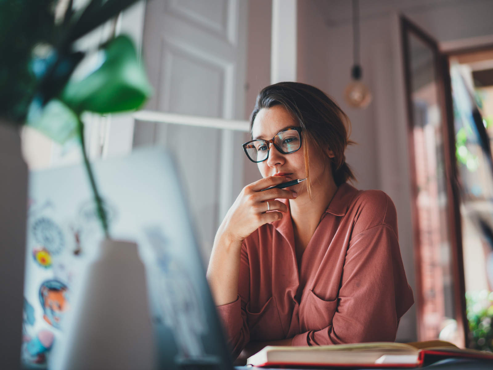woman looking at laptop